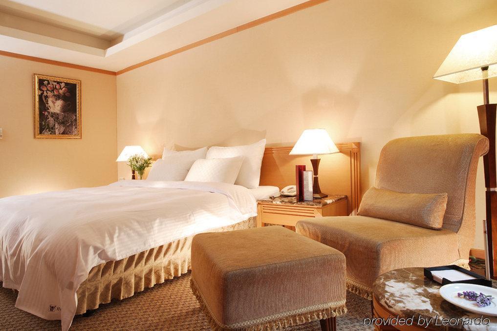 Hotel Dion Taichung Quarto foto